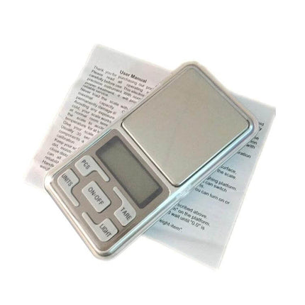 Portable Digital Pocket Scale for On-the-Go Weighing of Small Items - compact silver pocket scale with LCD and buttons