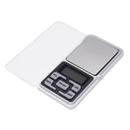 Portable Digital Pocket Scale for On-the-Go Weighing of Small Items - compact silver pocket scale with LCD, tare and units buttons
