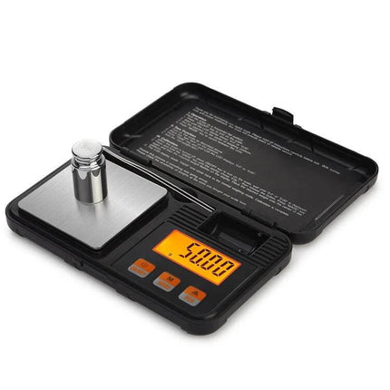 Portable Jewelry Scale 200g Capacity for Gems and Jewelry - compact black digital scale with 58×58mm pan, orange backlit HD LCD showing 5.000g