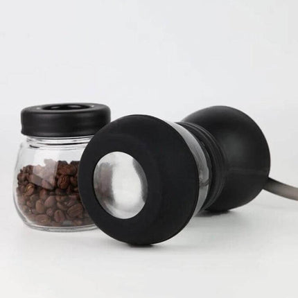 Portable Manual Coffee Grinder For Fresh Ground Beans shown with jar of coffee beans and compact black ceramic conical burr grinder