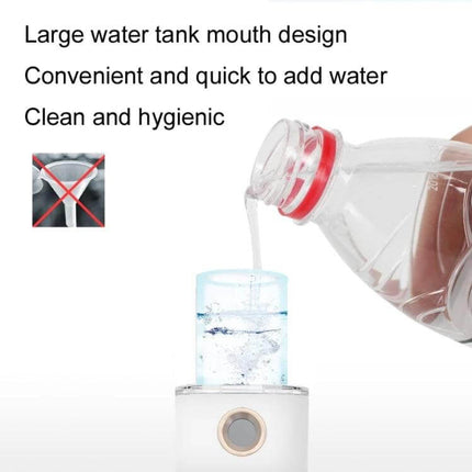 Portable Rechargeable Beauty Humidifying Sprayer For Facial Mist White – white compact facial mist with large 12ml water tank mouth being filled for travel hydration