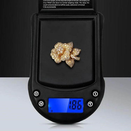 Precision Palm Scale For Jewelry 200g Capacity For Small Items showing a gold floral ring weighed on compact digital scale with 0.01g readability