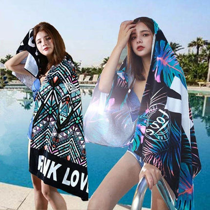 Printed Soft Bath Towel 147x71 cm For Home And Beach draped over model by pool in vibrant printed two-sided design