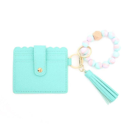 PU Tassel Silicone Bead Bracelet Wallet With Keychain Sunflower in aqua PU leather with scallop edge, sunflower charm, tassel and silicone bead bracelet keychain