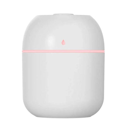 Quiet USB Plug In Humidifier For Car And Home Use Everyday - compact white 220ml USB plug-in humidifier with soft pink LED ring for cars and bedrooms
