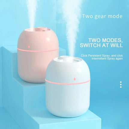 Quiet USB Plug In Humidifier For Car And Home Use Everyday compact 220ml USB plug-in humidifier in pink and white, two-gear mist mode for car and home