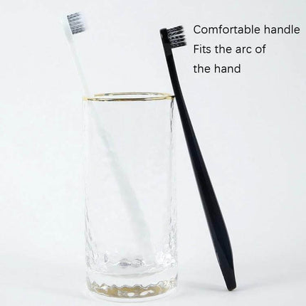 Raoyi Spiral Toothbrush Small Round Head For Daily Use - black and white compact toothbrushes with spiral bristles shown in glass, ergonomic handle