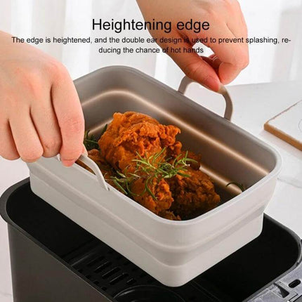 Rectangular Foldable Silicone Air Fryer Basket holding fried chicken with handles, nonstick liner for easy cleanup and compact storage