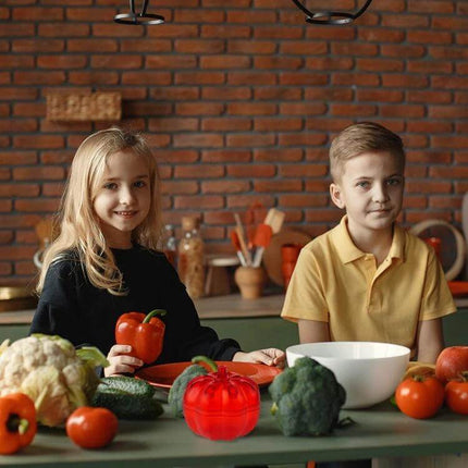 Red Pumpkin Fruit Fly Traps 2 Pack for Kitchen and Home on kitchen table near children and fresh produce, recyclable PP, bait not included