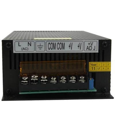 Regulated DC Power Supply Compact for Home Appliances – compact iron enclosure 0–12V output, wide AC 100–240V input, terminal connections visible