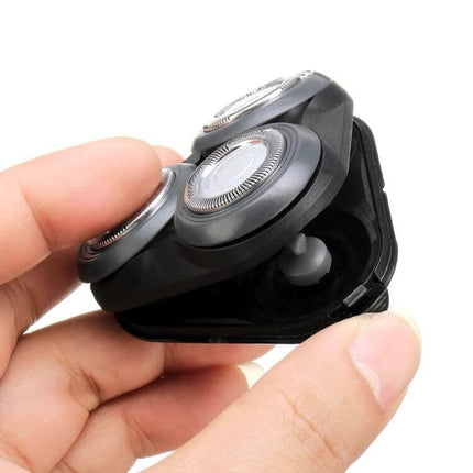 Replacement Shaver Head For Series 5000 Razor Spare Blade Easy To Install - close-up of black snap-on spare shaver head held in hand