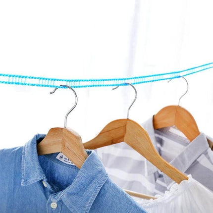 Retractable Clothesline 5m for Travel, Camping and Home Use - compact nylon retractable line with stainless hooks holding shirts on hangers