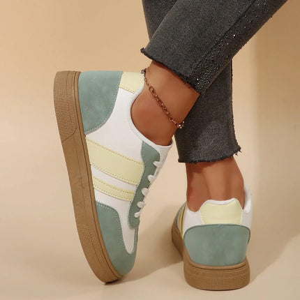 Retro Low Top Womens Green Casual Sneakers For Everyday Worn With Jeans, Showcasing A Stylish Low-Top Profile.