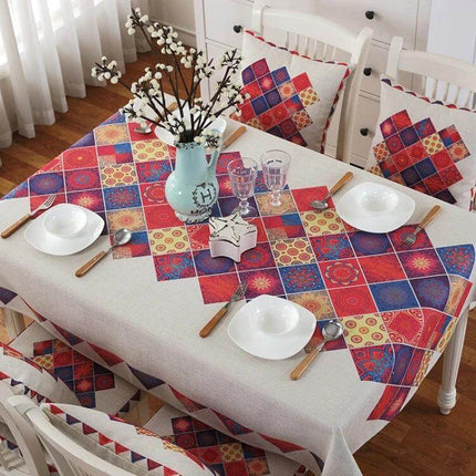 Retro Pattern Linen Table Cloth For Dinner 85x85cm on a decorated dining table with colorful retro patchwork squares, plates and vase centerpiece