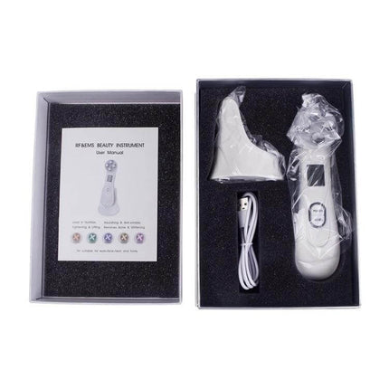 Radio Frequency Facial Beauty Pen For Wrinkle Reduction in open gift box with manual, USB cable and attachments, white acrylic rechargeable device