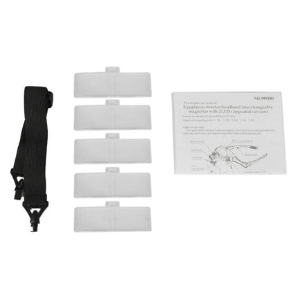 Adjustable Headband Magnifier with LED Lights and Multiple Lenses showing five interchangeable lenses, head strap and instruction sheet