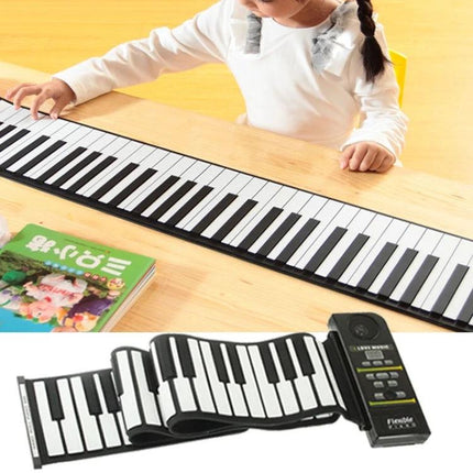 Child practicing on a Roll-Up Piano for Everyday Music Practice on the Go unrolled on a desk with portable keyboard controller