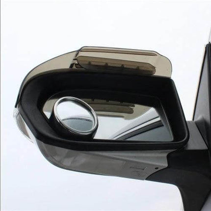 Durable Flexible Rain Shield for Car Rearview Mirrors, 2 Pack installed on side mirror deflecting rain to maintain clear visibility