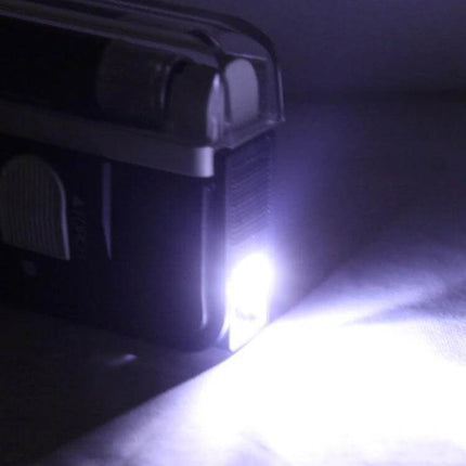 Handheld Security Feature Verifier for Banknotes And Passports emitting UV light to reveal watermarks and security strips on currency and passport paper