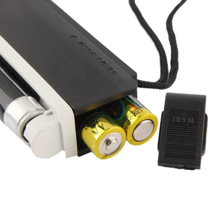 Security Feature Verifier for Banknotes And Passports handheld compact unit showing battery compartment with two AA batteries and wrist strap