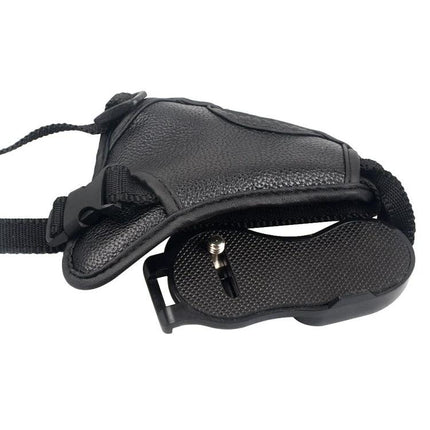 Leather Camera Grip with Adjustable Strap for Secure Camera Handling shown in black leather with adjustable buckle and mounting screw