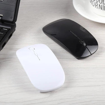 Wireless Optical Mouse for Everyday Computing Use - sleek black and white 2.4GHz wireless optical mice on desk, low-profile ergonomic design for office and casual gaming