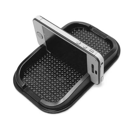 Universal Car Phone Holder With Washable Anti-Slip Pad on dashboard holding smartphone and preventing sliding