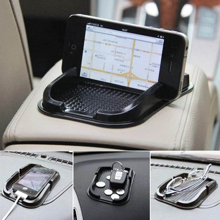 Universal Car Phone Holder With Washable Anti-Slip Pad on car dash holding phone, keys and coins to prevent sliding and reduce driver distractions