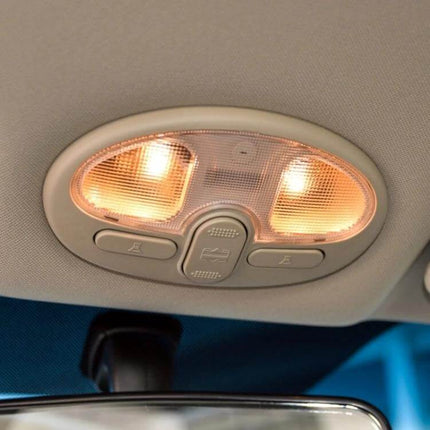 Car Reading Light 31mm Bulb For Nighttime Reading In Car - lit interior dome reading lamp showing warm white LEDs in car ceiling
