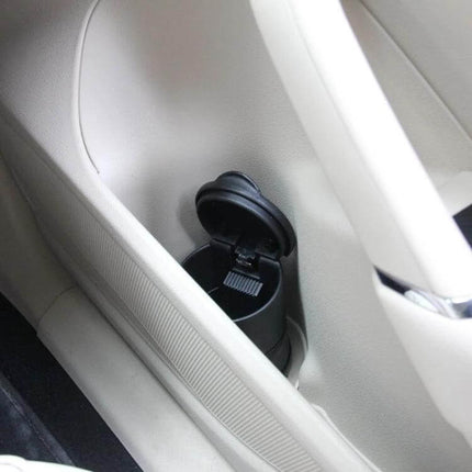 Portable Car Ashtray, Compact 6.9x6.9x10 Cm For Travel - black portable ashtray placed in car door storage, lid open for travel and easy cleaning
