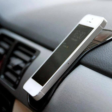 Car Anti-Slip Sticky Mat for Phones and Car Accessories securing smartphone on dashboard during drive, durable rubber non-slip grip