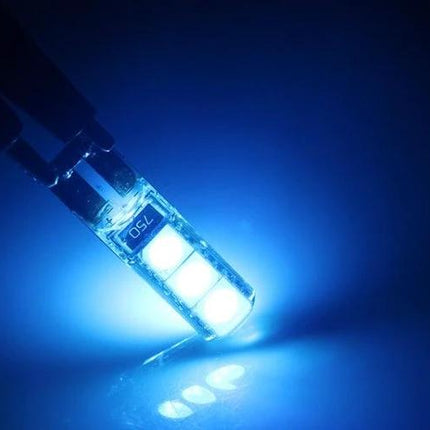 Ice Blue Vehicle LED Bulbs for Turn Signals and Brake Lights glowing close-up, high-brightness LED, low power draw, multi-function replacement