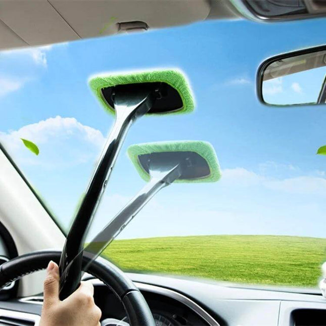 Windshield Wonder Cleaner for Car Windows and Windshields being used with pivoting head to clean interior windshield corners