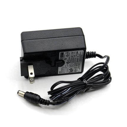 Compact Tool for BMW Key Updates in Garage Maintenance - compact power adapter for secure key programming and chip read/write