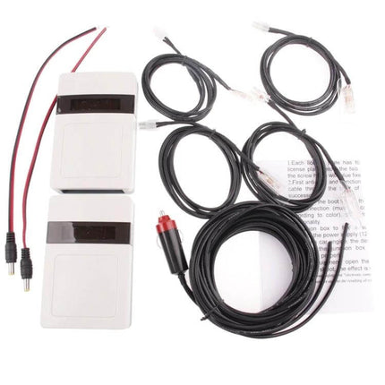 Car License Plate Anti-Radar Device for Traffic Protection white modules and wiring kit laid out on white background