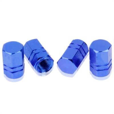 Blue Anodized Aluminum Tire Valve Stem Caps Set of 4 shown as four blue anodized aluminum screw-on caps protecting valve stems