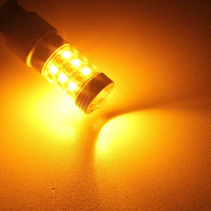 White and Amber LED Car Light Bulb for Parking and Turn Signals showing amber LED lit for turn signal and compact plug‑and‑play design
