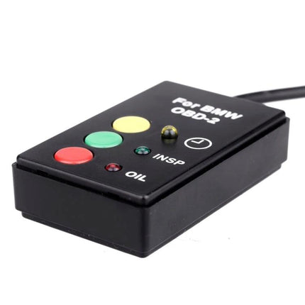 Reset Tool for BMW Service Intervals During Routine Maintenance - compact OBD2 reset device with colored buttons for oil and inspection