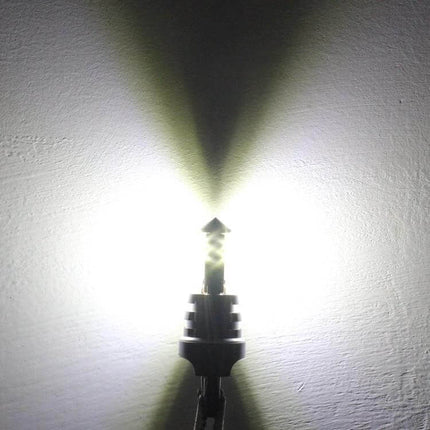 LED Car Fog Light Bulb White for Clear Driving Everyday Use - bright white LED fog/backup light showing focused beam on wall, plug-and-play 12V replacement