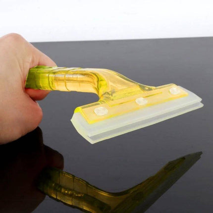 Car Window Glass Wiper with Non-Slip Handle for Easy Cleaning held on car windshield for streak-free cleaning
