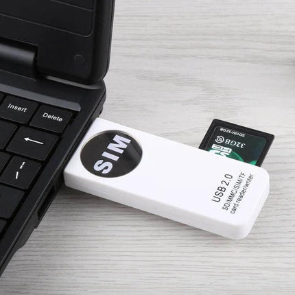 Universal Card Reader for SD, MMC, SIM, and TF Cards USB 2.0 plugged into laptop with SD card and SIM slot visible