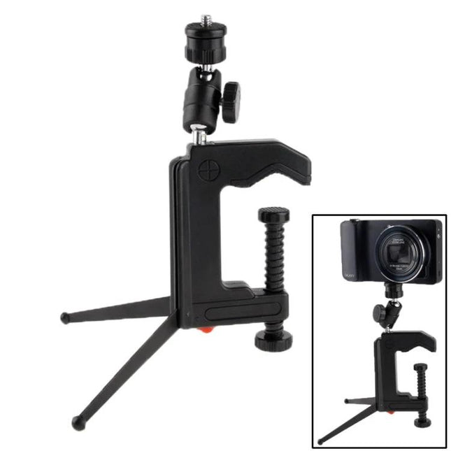 Portable Folding Clamp Tripod for Mini Digital Cameras clamping mini camera on table with foldable legs, rubber pads and 1/4-inch mount