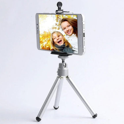 Tripod for Daily Phone Photography at Home and on Trips showing smartphone on compact tabletop tripod with family selfie