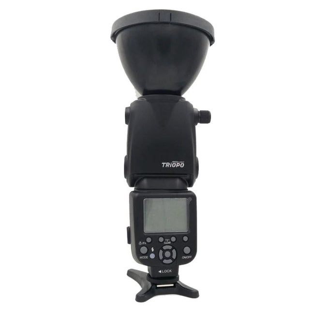 Triopo Flash Speedlite for Canon and Nikon DSLR Cameras — front view of external flash unit with diffuser, LCD screen and hotshoe mount