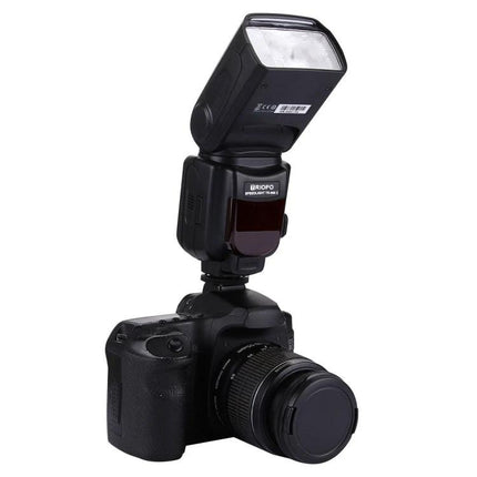 Triopo Flash Speedlite for Canon and Nikon DSLR Cameras mounted on DSLR showing adjustable head and hot shoe connection for low-light shooting