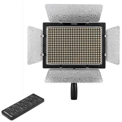Yongnuo LED Video Light for Canon, Nikon, and Sony DSLR Cameras mounted with barn doors and remote, adjustable brightness and color temperature