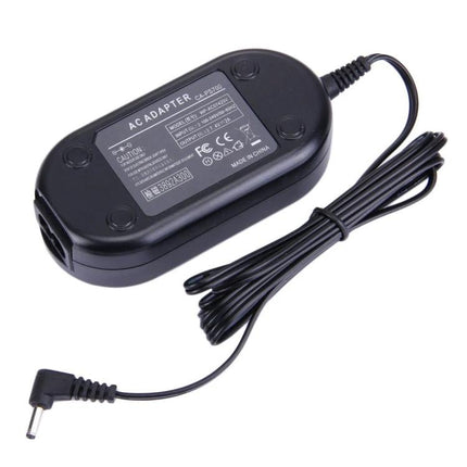 AC Power Adapter Set for Canon EOS Digital Cameras showing black AC adapter with cable and DC plug for extended studio shooting