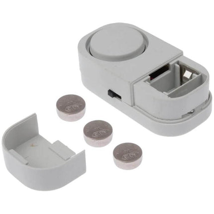 Wireless Magnetic Sensor Alarm for Doors and Windows - compact white vibration-activated door and window alarm with 3 button batteries