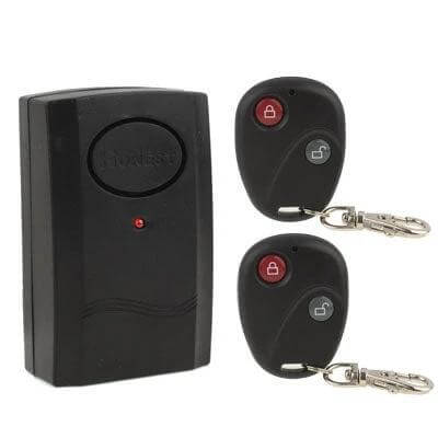 Wireless Vibration Alarm with Remote Control for Home Security small black alarm unit with two remote keyfobs for doors and windows