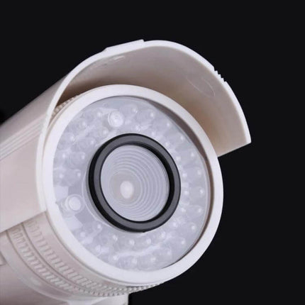 Realistic Dummy Security Camera with Flashing Red LED Light mounted white faux surveillance camera with visible LED ring to deter intruders